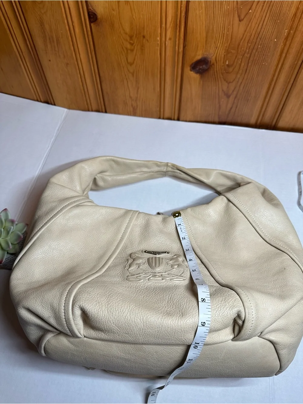 Cream Leather Shoulder Hobo Bag with Embossed Crest